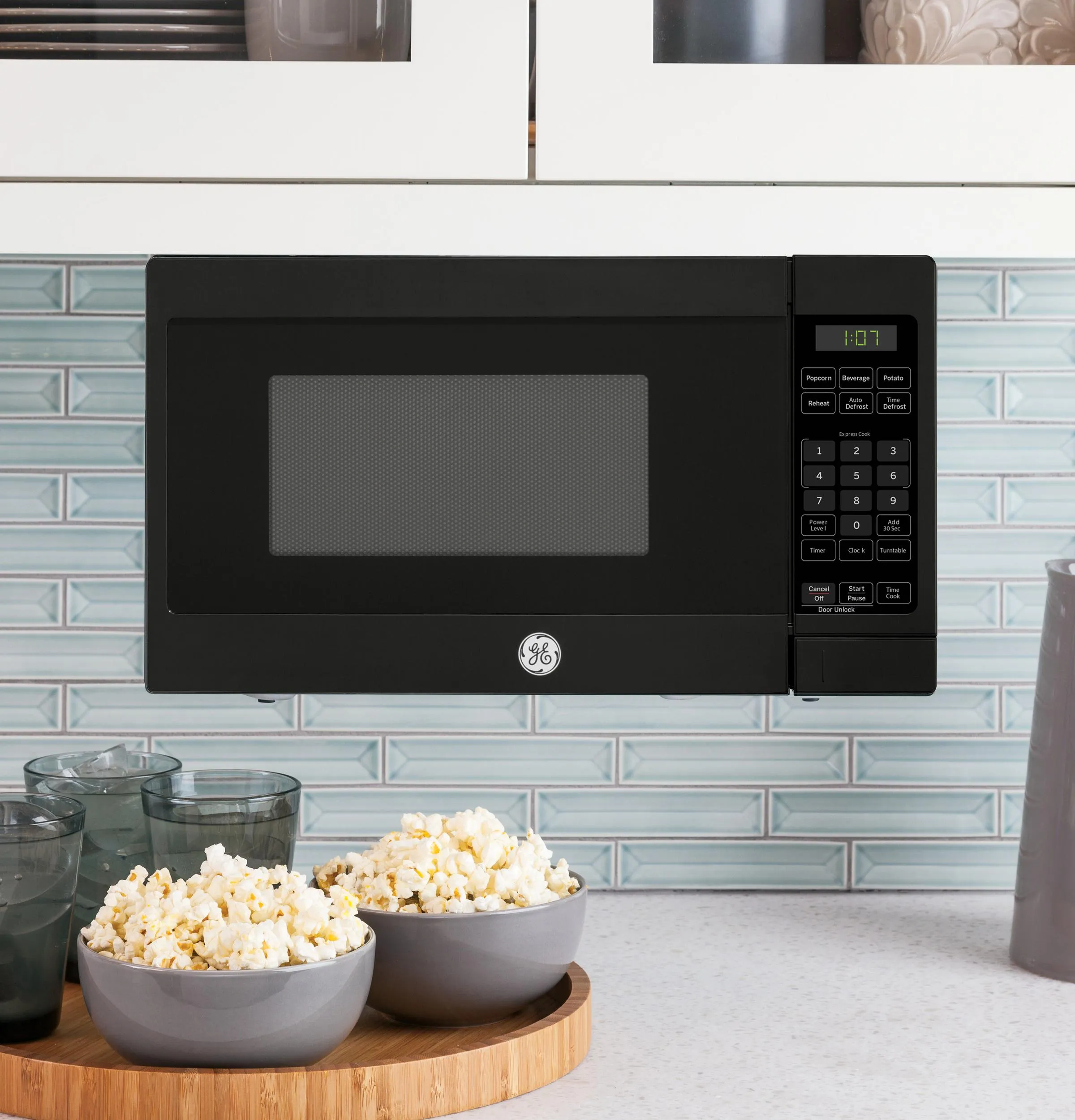 Ge Appliances GCHK07N1WBB Ge 0.7 Cu. Ft. Spacemaker Countertop Microwave Oven